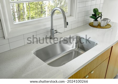 Modern kitchen interior with a window Royalty-Free Stock Photo #2024100266