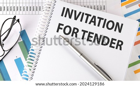 INVITATION FOR TENDER text , pen and glasses on chart