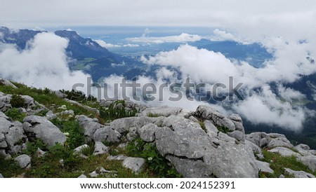 view from a mountain on bavaria in clouds
