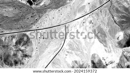   human landscape,   abstract photography of the deserts of Africa from the air in black and white, aerial view of desert landscapes, Genre: Abstract Naturalism, from the abstract to the figurative, 