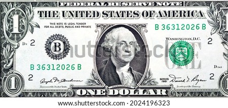 Large fragment of the Obverse side of 1 one dollar bill banknote series 1981 with the portrait of president George Washington, old American money banknote, vintage retro, United States of America Royalty-Free Stock Photo #2024196323