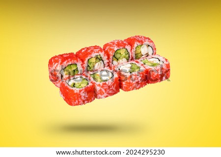Sushi and roll on yaellow background