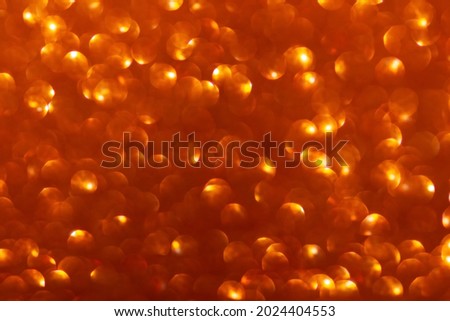 Red orange abstract blured background. Soft focus. Defocused. Summer, Spring, Merry Christmas or Happy New Year bokeh. Copy space