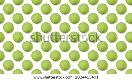 Close-up of a green tennis ball on a white background. The sports symbol of lawn tennis. Pattern Royalty-Free Stock Photo #2024415401