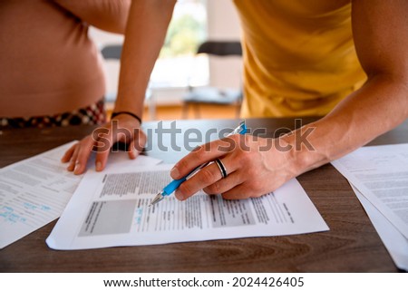 Cut out image of Male student hand with typing document. Submission of essays on University class. Entrance exam to the faculty Royalty-Free Stock Photo #2024426405
