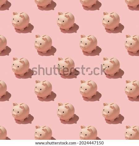 Top view photo of piggy banks pattern on isolated pastel color pink background