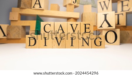 Cave diving created from wooden cubes. Sports . close up.
