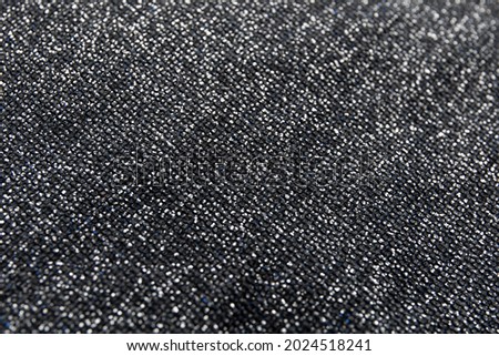 Fabric evening gray dress girl with sequins, rhinestones. colorful sequined texture Royalty-Free Stock Photo #2024518241