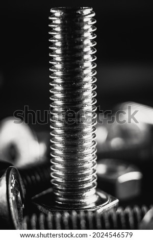 Old nut and bolts for background, Black and white photo.