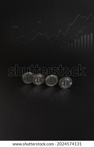 Four Silver Bitcoin coin currency. Crypto coin with growth chart. International stock exchange.