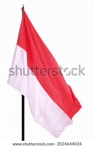 Indonesian flag waving on pure white background, close up, Indonesian National symbol. Close up flying flag with clipping path.