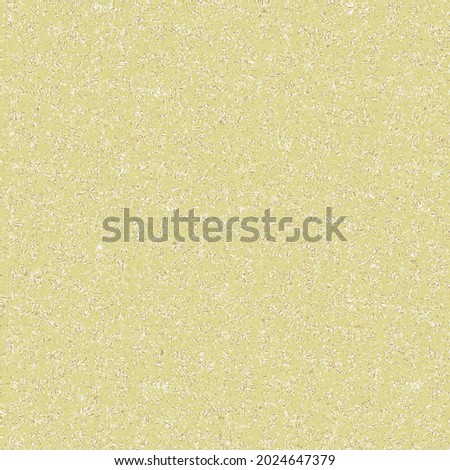 Grainy texture of a golden wall. Plywood with particles of compressed sawdust. Plaster background.