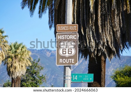 A vintage sign indicating Route 66 in California                               