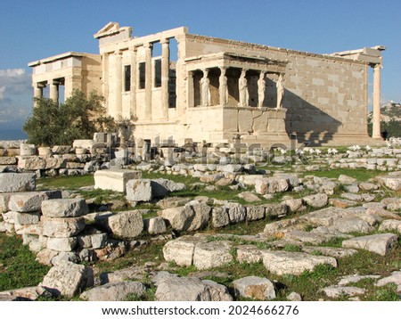 A view of The Erechtheion and its statues, located on the northern side of the Acropolis.  Image has copy space. Royalty-Free Stock Photo #2024666276