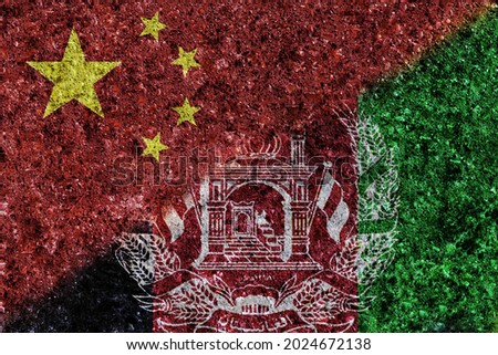 China and Afghanistan flags together painted on grunge texture wall