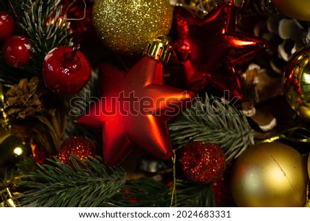 toys for decorating a Christmas tree. yellow balls, toy cones, red star, large