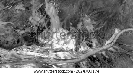 the bonfire of the vanities,  abstract photography of the deserts of Africa from the air in black and white, aerial view of desert  Genre: Abstract Naturalism, from the abstract to the figurative, 