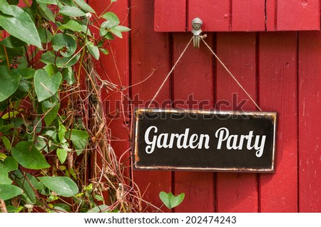 Old metal sign with the inscription Garden Party