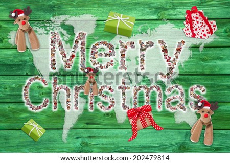 Merry christmas greetings with text on green wooden background - letters of different xmas images.