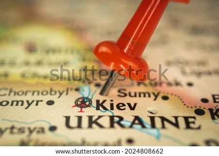 Location Kiev in Ukraine, push pin on map closeup, marker of destination for travel, tourism and trip concept, Europe Royalty-Free Stock Photo #2024808662