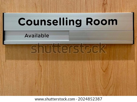 Sliding door signage of a counselling room. Available and Unavailable indicator. Aluminium sign plate.