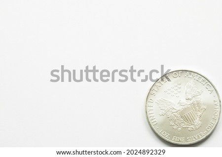 Walking liberty dollar eagle side flat lay on white isolated background