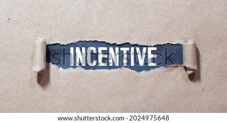 Incentive Word Written In Wooden Cube