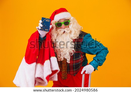 Santa Claus holding the Brazilian passport