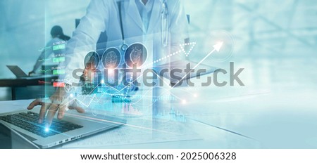 Healthcare business graph data and growth, Medical examination and doctor analyzing medical report on network connection on virtual screen. Healthcare investment and financial. Royalty-Free Stock Photo #2025006328