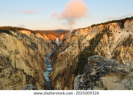 Overlook beautiful sunrise of south rim of the Grand Canyon of the Yellowstone from Artist Point  in Yellowstone National Park, Wyoming USA. Royalty-Free Stock Photo #2025009326
