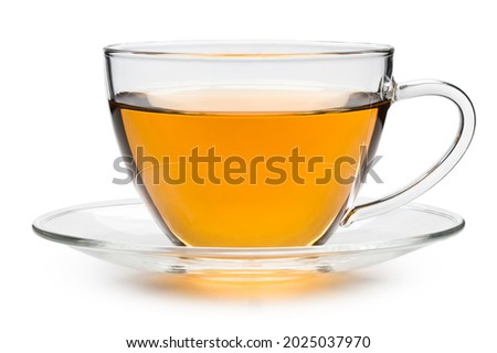 Tea. Cup of classic black tea. Clear glass Teacup and saucer. Good Morning. For Breakfast flower or herb hot tea. Mug with aromatic drink. Macro High resolution photo. White isolated background.  Royalty-Free Stock Photo #2025037970