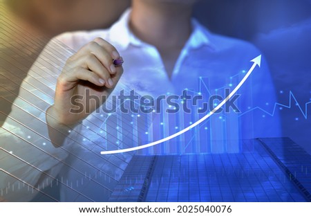 businesswoman set goal analysis chart and graph evolving and growing global economy growth goal setting ideas from a large corporate business valuation. Royalty-Free Stock Photo #2025040076
