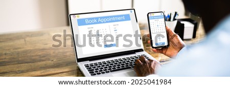 Booking Meeting Appointment On Laptop Computer Online Royalty-Free Stock Photo #2025041984