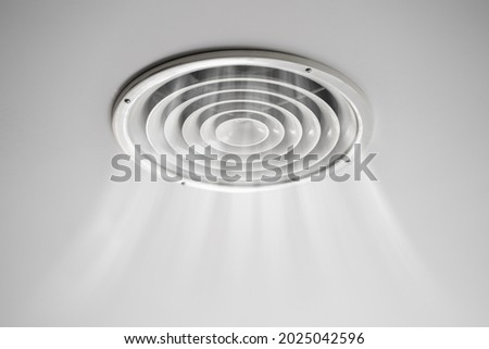 Home Room Ceiling Ventilation. Modern Interior Air Vent Royalty-Free Stock Photo #2025042596