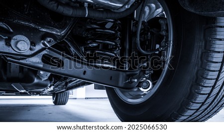 Technical photo. The structure of the modern car. Rear suspension. Shock absorber. Spring suspension. Royalty-Free Stock Photo #2025066530