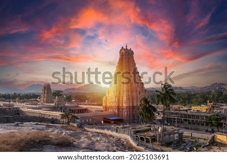 Stunning view at Sree Virupaksha Temple in Hampi on the banks of Tungabhadra River, UNESCO World Heritage Site, Karnataka, India. Indian tourism Royalty-Free Stock Photo #2025103691