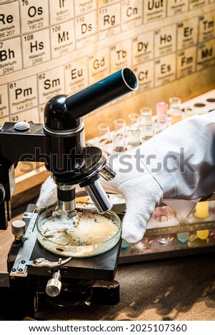 Academic laboratory with microscope and sample. Practical chemistry classes.