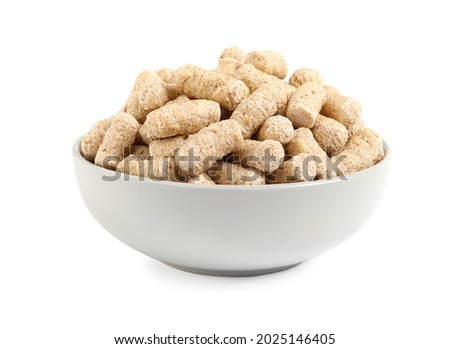 Granulated wheat bran in bowl on white background