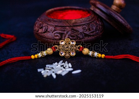 Small Gilettery rakhi closeup image for Raksha bandhan or Rakhi occasion in India.