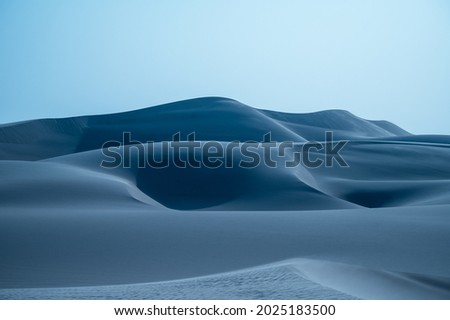 Abstract texture lines in the desert, close-up of arid land. Yellow background picture. The desert features of Africa.