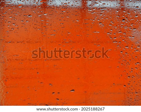 raindrops on orange wall background