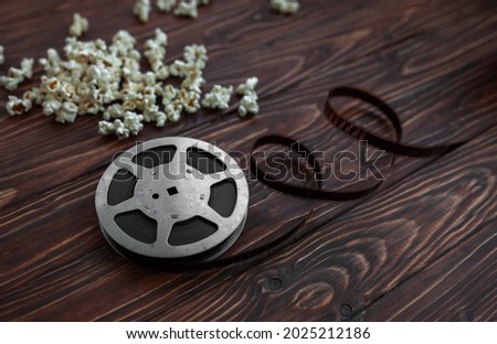 film strip on a wooden background. selective focus