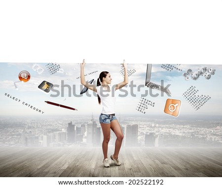Young woman in casual holding white blank banner. Place for text