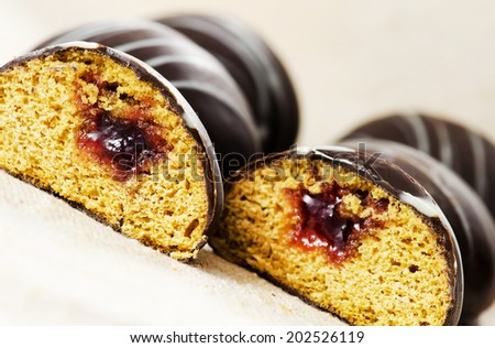Chocolate  gingerbread filled with jam.Close up image.