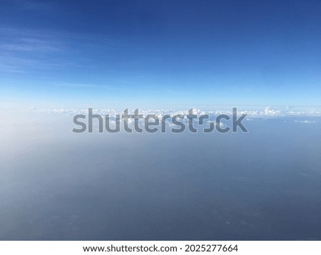 the horizon above the clouds