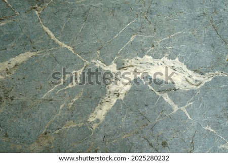 The stone floor has a beautiful pattern.