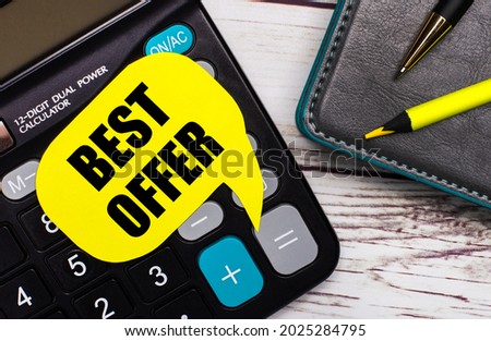 On a light wooden table, there is a calculator, a notebook, a pen, a yellow pencil, and a yellow card with the text BEST OFFER. Business concept.