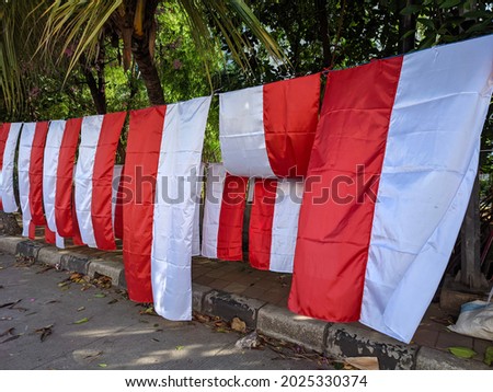 Indonesian flags are sold on the roadside, by seasonal sellers ahead of the celebration of the independence of the republic of Indonesia