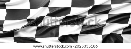 Checkered black and white racing flag Royalty-Free Stock Photo #2025335186