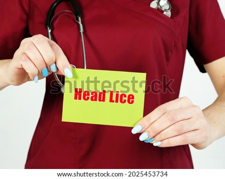 Healthcare concept meaning Head Lice with inscription on the page.
